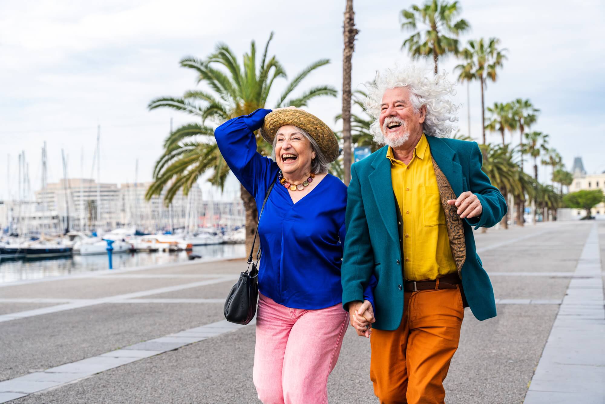 Senior couple holding hands